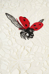 White ladybird lace cape